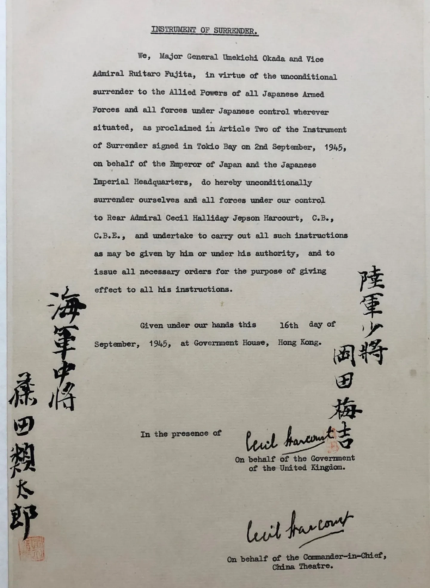 Signed instrument of surrender featuring Japanese characters