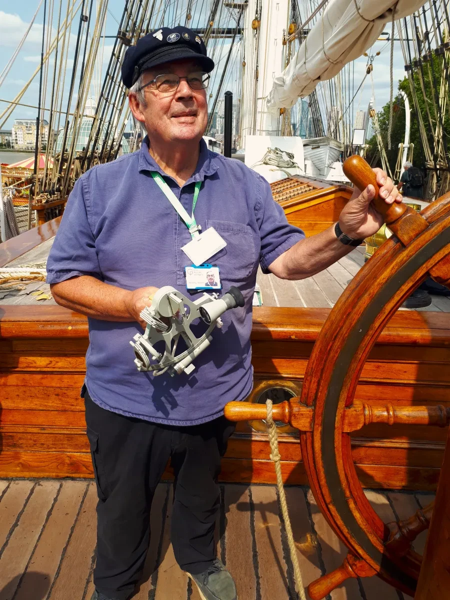 Photo of Jeremy Noble standing on main deck of historic tea clipper Cutty Sark