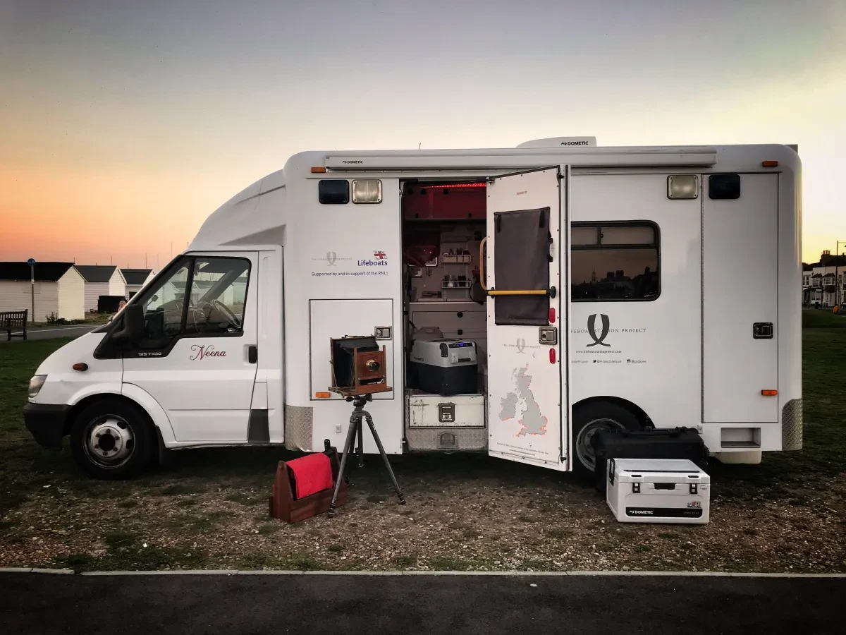 Picture of a white ambulance converted into a photographic darkroom