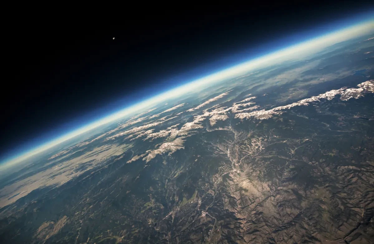 Astronomy photograph of Earth and the Moon.