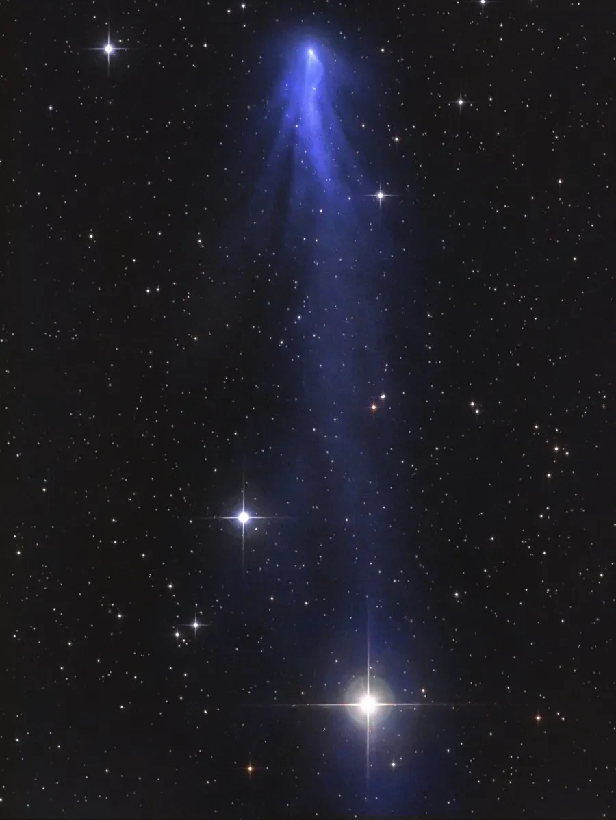 Astronomy photograph of comet tails.